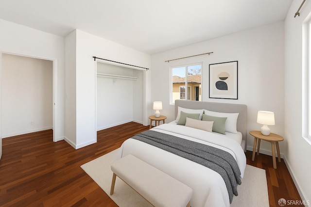 906 40th St, Oakland, CA 94608 - bedroom featuring a closet, wood finished floors, and baseboards