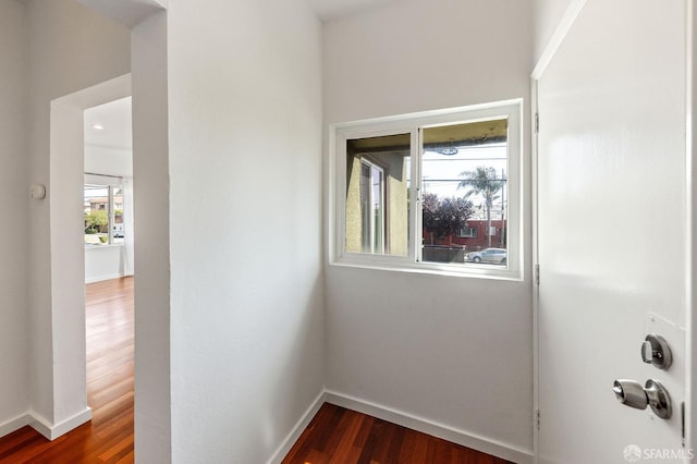 906 40th St, Oakland, CA 94608 - corridor with dark wood-type flooring and baseboards