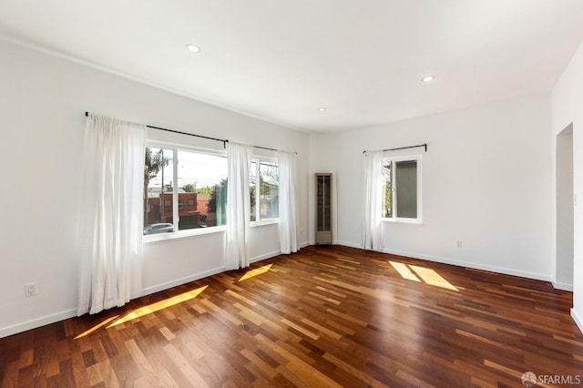 906 40th St, Oakland, CA 94608 - spare room featuring wood finished floors, baseboards, and recessed lighting