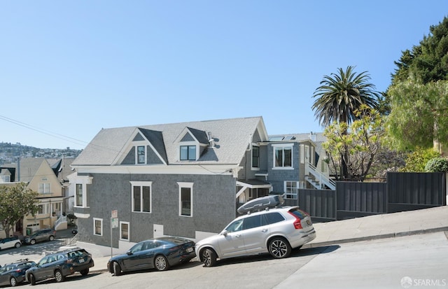 view of front of home with fence