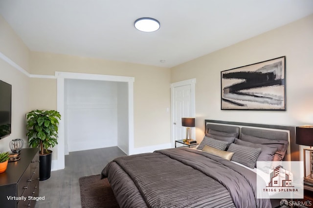 bedroom featuring hardwood / wood-style flooring