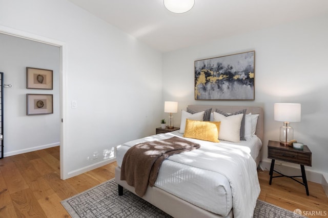 bedroom featuring hardwood / wood-style floors