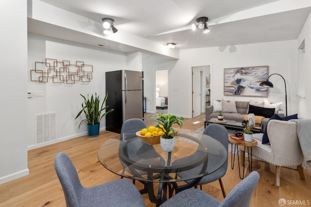 dining room featuring light hardwood / wood-style floors