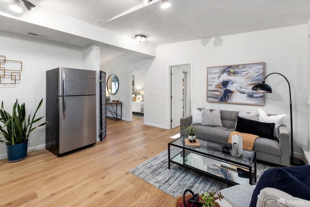 living room featuring light hardwood / wood-style floors