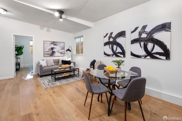 dining room with light hardwood / wood-style floors