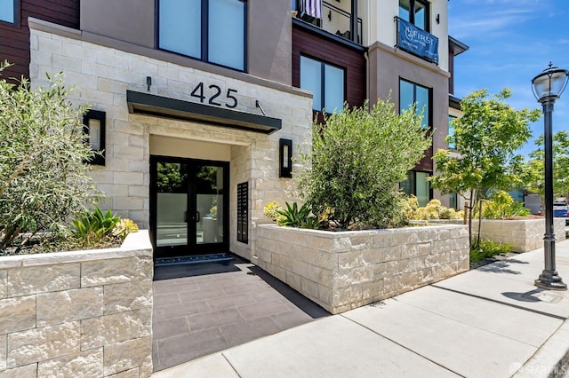 425 First St Unit 31, Los Altos, CA 94022 - property entrance featuring french doors and stone siding