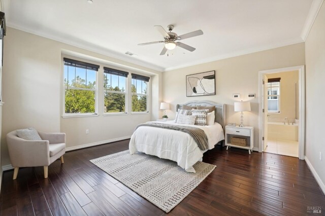 bedroom featuring ceiling fan, connected bathroom, ornamental molding, and dark hardwood / wood-style floors