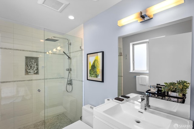 229 8th St Unit 3, San Francisco, CA 94103 - bathroom featuring a tile shower, recessed lighting, and vanity