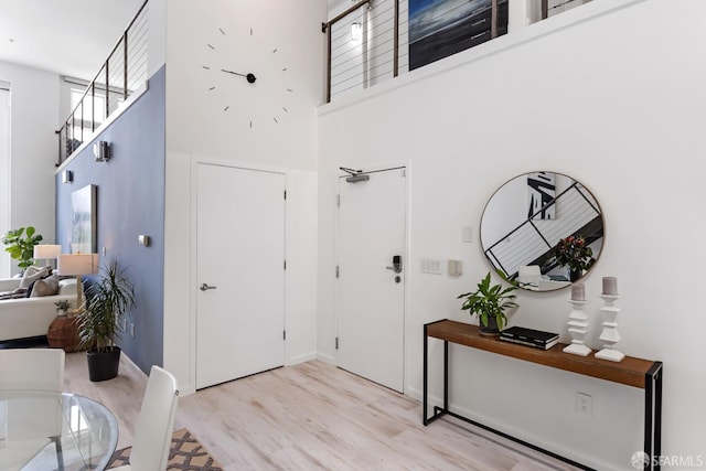 229 8th St Unit 3, San Francisco, CA 94103 - foyer featuring a towering ceiling and wood finished floors