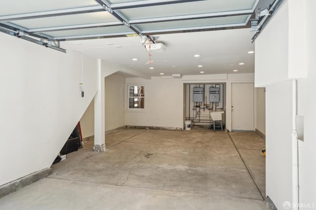 28-30 Sonoma St, San Francisco, CA 94133 - garage with a garage door opener, recessed lighting, and baseboards