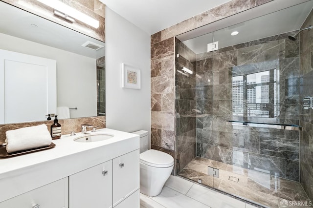 bathroom with vanity, toilet, and walk in shower