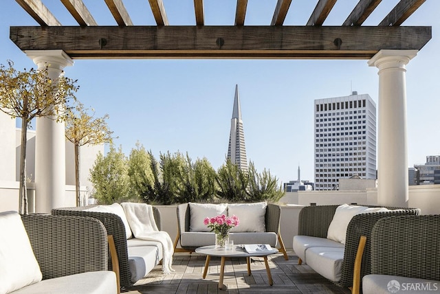 balcony featuring a pergola and outdoor lounge area