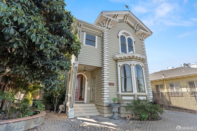 italianate house with fence