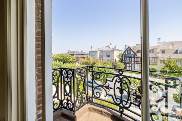 balcony featuring a residential view