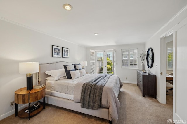 bedroom with access to exterior, light colored carpet, crown molding, baseboards, and recessed lighting