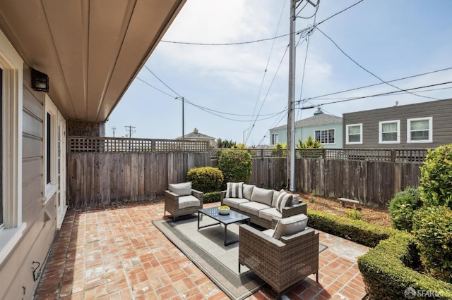 view of patio / terrace with an outdoor hangout area and a fenced backyard