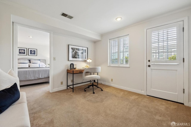 carpeted home office with crown molding and baseboards