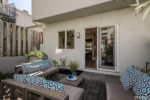 view of patio featuring fence