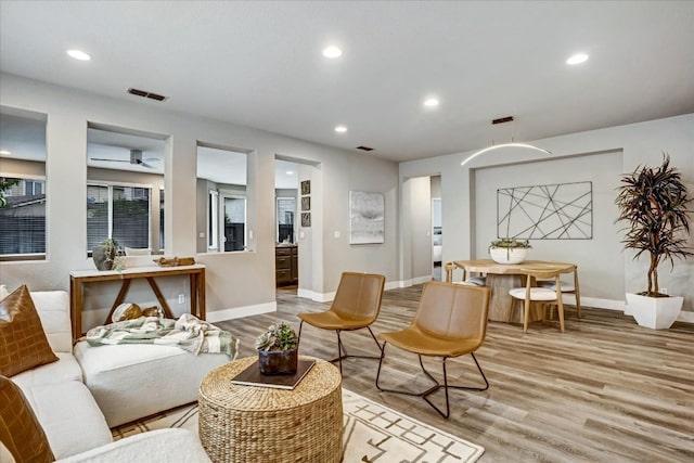 living room with light hardwood / wood-style floors