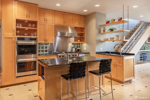 kitchen featuring open shelves, dark countertops, double oven, under cabinet range hood, and a sink