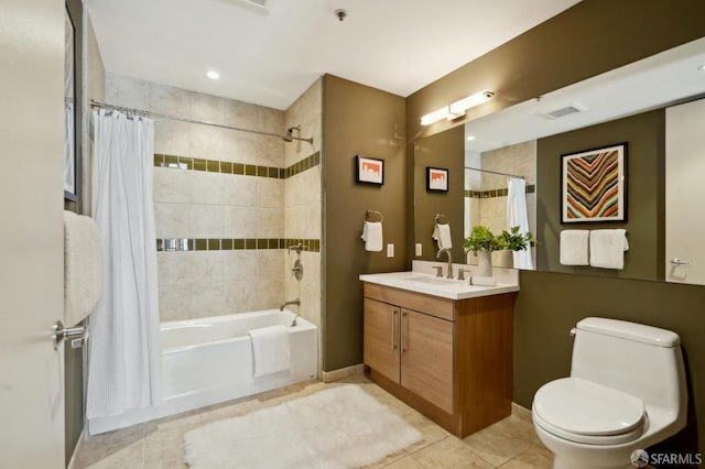 1 S Park St Unit 308, San Francisco, CA 94107 - bathroom with tile patterned floors, vanity, shower / bath combo with shower curtain, toilet, and baseboards