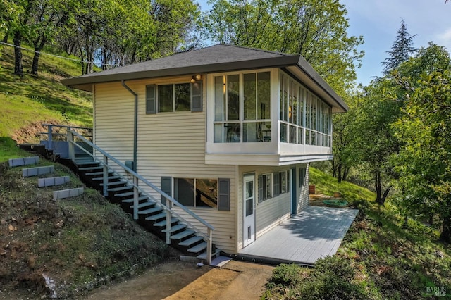 3100 Soda Canyon Rd, Napa, CA 94558 - view of front of home featuring stairway, a deck, and a sunroom