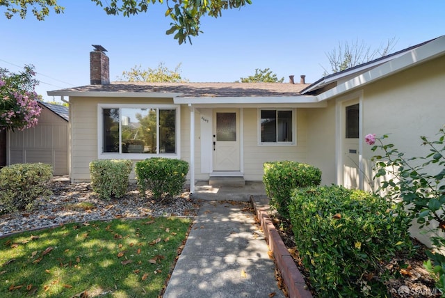 4649 Theta St, Fremont, CA 94536 - entrance to property featuring a chimney and a shingled roof