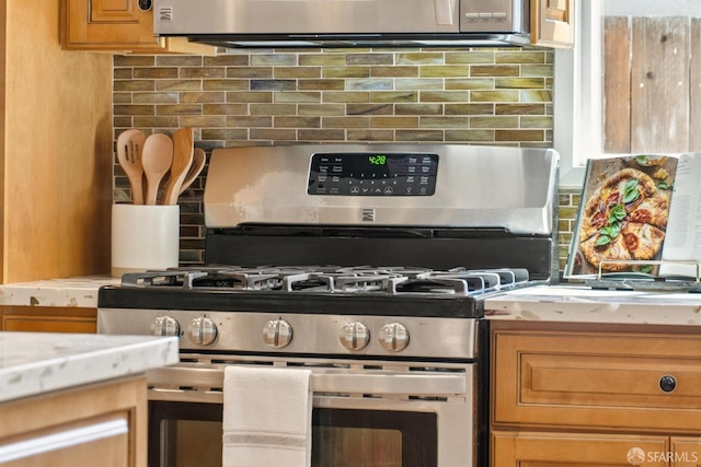 4649 Theta St, Fremont, CA 94536 - kitchen with stainless steel appliances, decorative backsplash, and light countertops