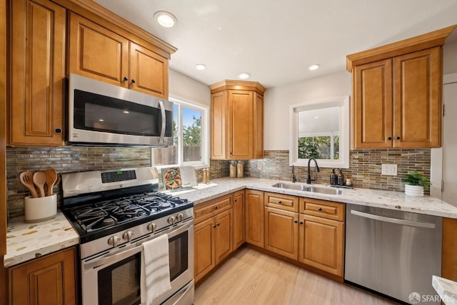 4649 Theta St, Fremont, CA 94536 - kitchen featuring appliances with stainless steel finishes, light stone countertops, backsplash, and recessed lighting