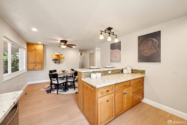 4649 Theta St, Fremont, CA 94536 - kitchen featuring a peninsula, light wood finished floors, light stone counters, ceiling fan, and recessed lighting