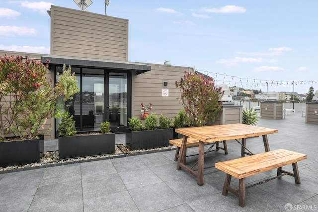 1188 Valencia St Unit 403, San Francisco, CA 94110 - view of patio featuring outdoor dining area and exterior kitchen