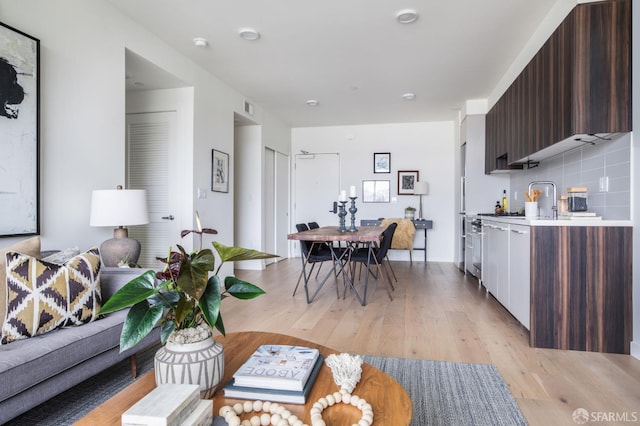 1188 Valencia St Unit 403, San Francisco, CA 94110 - living area featuring light wood-style flooring