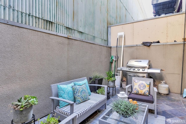 view of patio / terrace featuring area for grilling and an outdoor living space