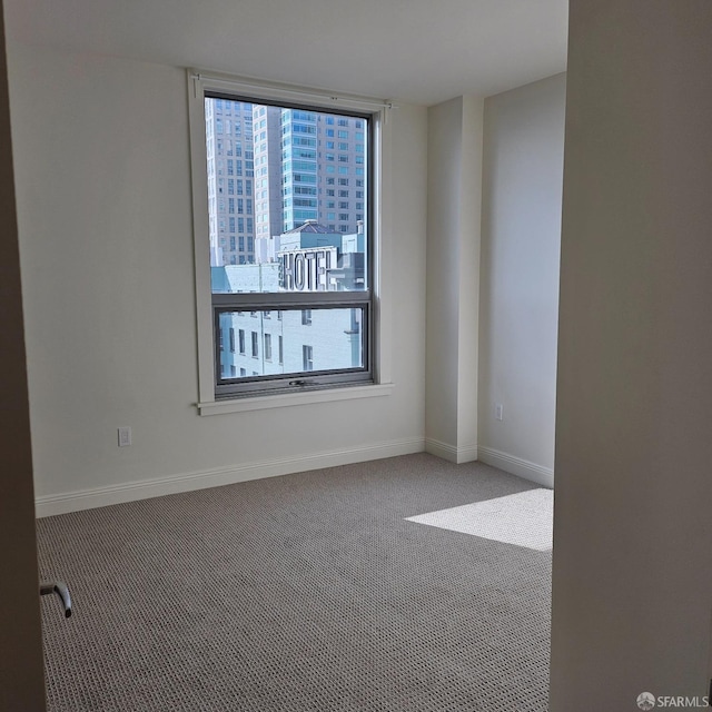 view of carpeted spare room