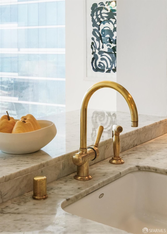 401 Harrison St Unit 25F, San Francisco, CA 94105 - detailed view of a sink and light stone counters