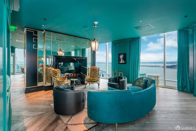 401 Harrison St Unit 25F, San Francisco, CA 94105 - living area featuring a wall of windows, attic access, and a water view