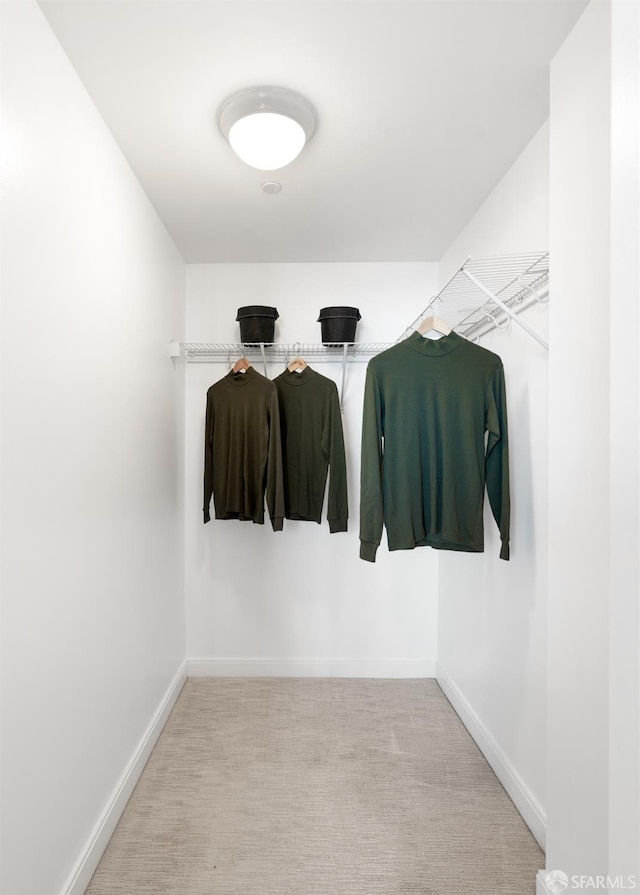 401 Harrison St Unit 25F, San Francisco, CA 94105 - walk in closet featuring carpet flooring