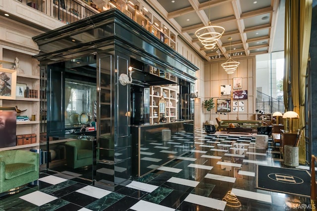 401 Harrison St Unit 25F, San Francisco, CA 94105 - building lobby with coffered ceiling, beam ceiling, and a towering ceiling