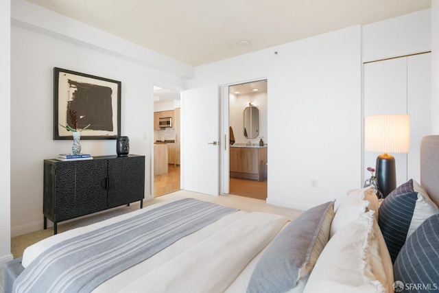 401 Harrison St Unit 25F, San Francisco, CA 94105 - bedroom featuring light carpet and baseboards