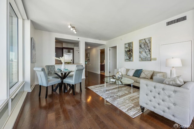 living room featuring dark hardwood / wood-style floors