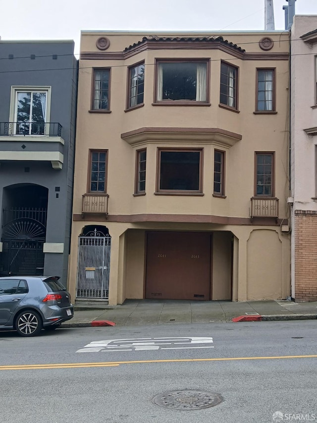 2041-2043 Fulton St, San Francisco, CA 94117 - view of property with an attached garage