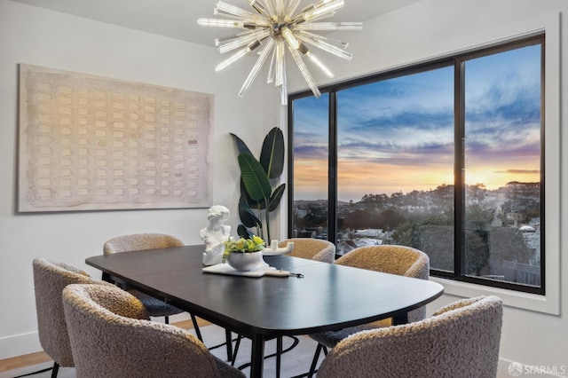 dining room featuring a notable chandelier