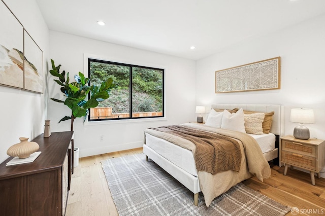 bedroom featuring light hardwood / wood-style flooring