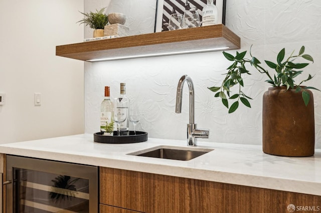 bar featuring wine cooler and sink