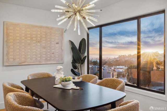 dining space featuring a chandelier