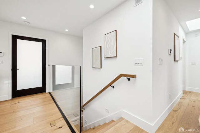 corridor featuring light wood-type flooring