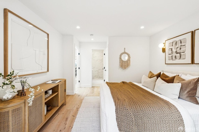 bedroom featuring light wood-type flooring