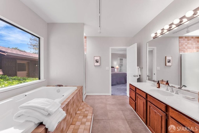 35 Ardilla Rd, Orinda, CA 94563 - bathroom with vanity, a jetted tub, connected bathroom, and tile patterned floors