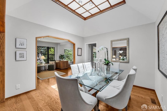35 Ardilla Rd, Orinda, CA 94563 - dining room with light wood-style floors and arched walkways
