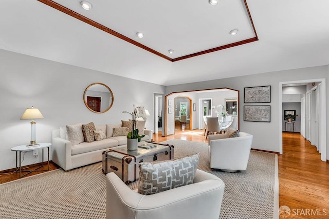 35 Ardilla Rd, Orinda, CA 94563 - living room featuring light wood-style flooring, arched walkways, recessed lighting, and ornamental molding